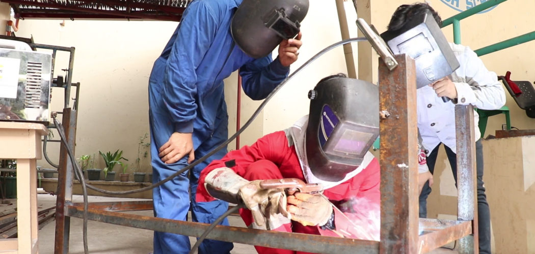 NCII-certified students of Shielded Metal Arc Welding course at Pasay City North High School Main repair school facilities.